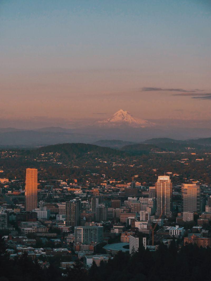 Aerial view of Portland Oregon neighborhoods with Mount Hood in the background